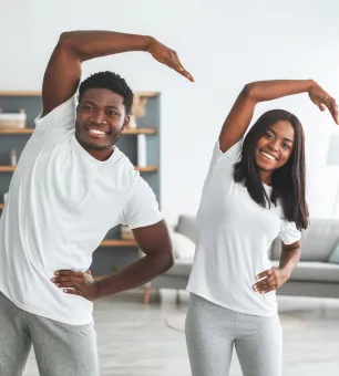 couple performing shoulder exercises