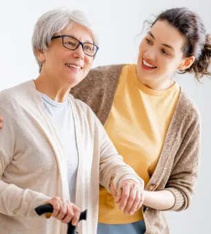 woman assisting elderly