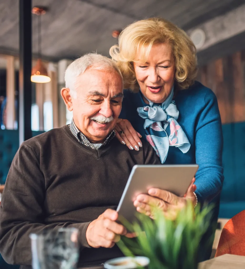 Older couple looking at an ipad
