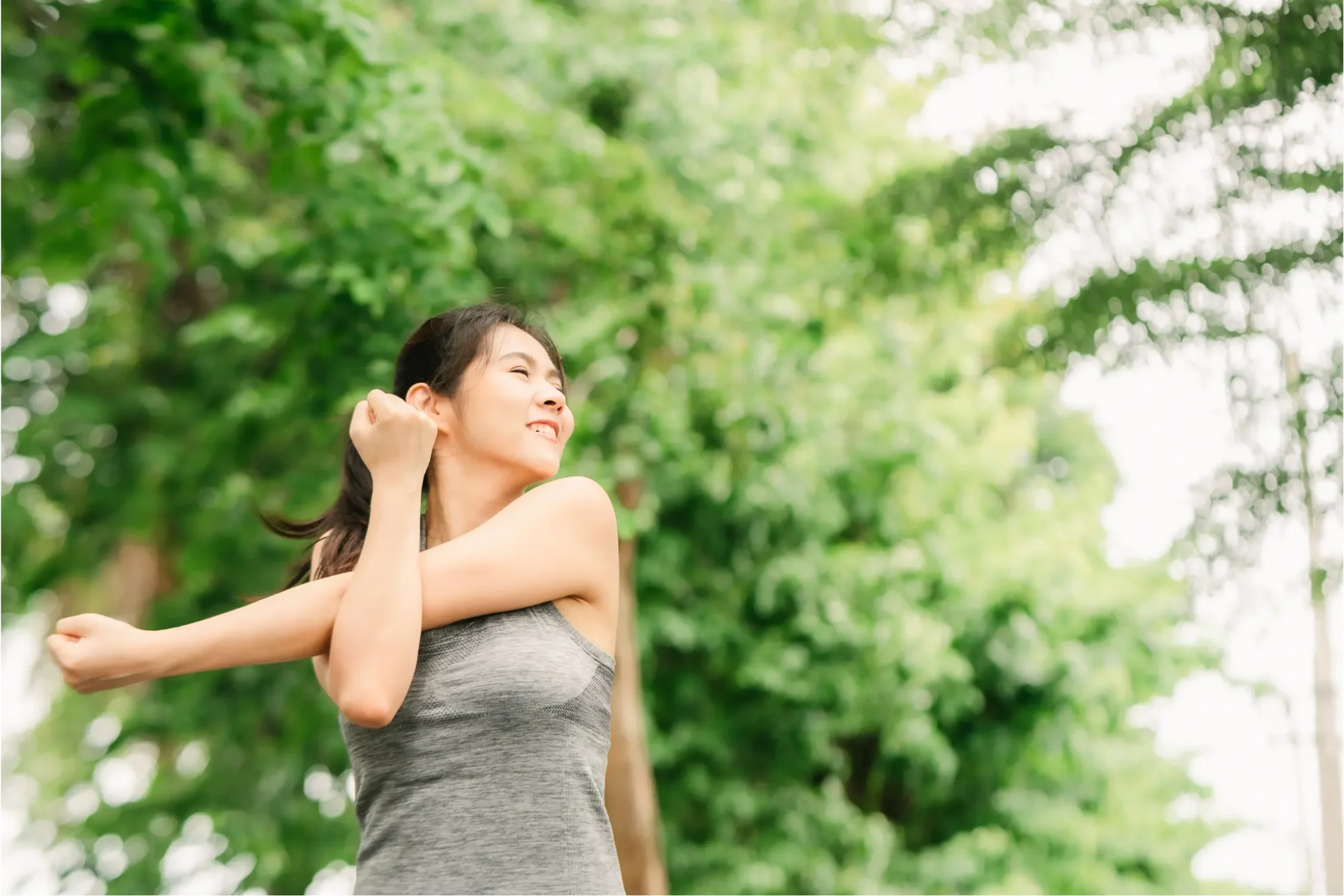 Woman stretching shoulders
