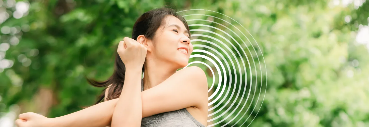 Woman stretching with design in the background